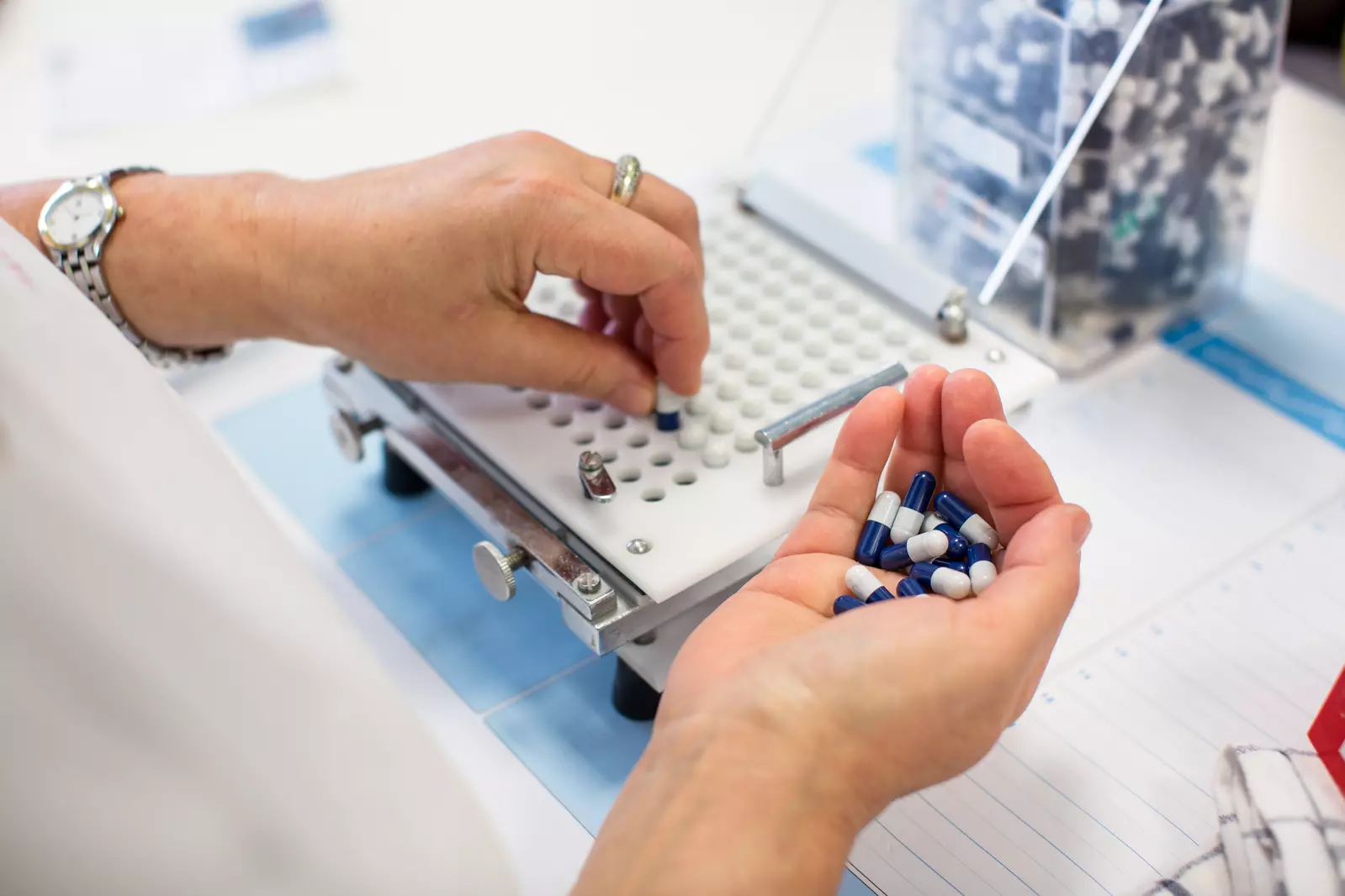 woman pharmacist with tablet 